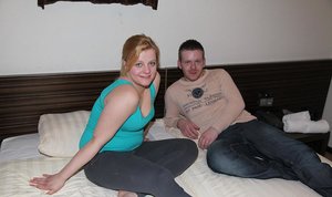 18 year old girl Katie Lewis stands naked after undressing in her bedroom